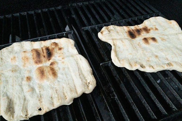 pizzas on the grill