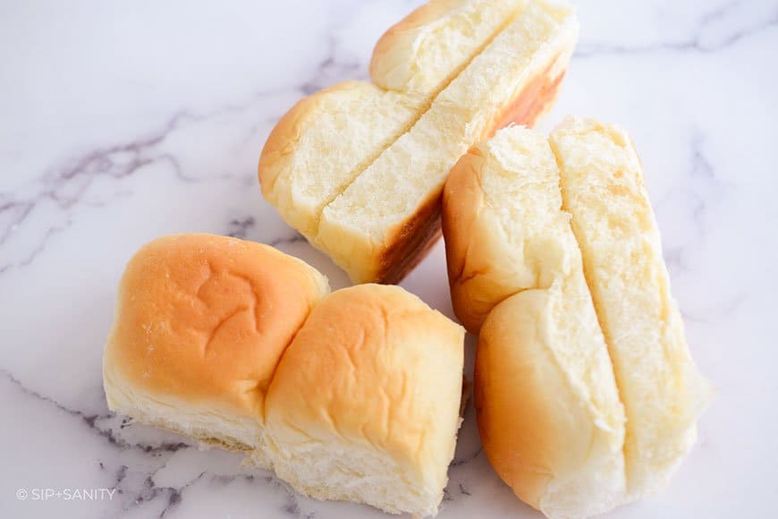 Hawaiian rolls sliced into sandwich buns