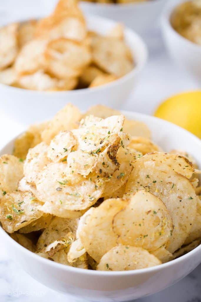 a bowl of lemon and herb seasoned chips