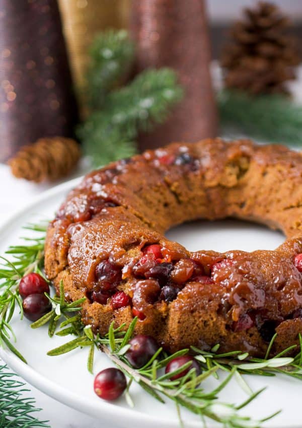 cranberry gingerbread bundt bake on a platter
