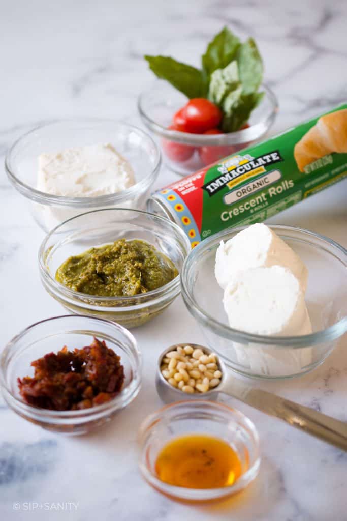 ingredients for pesto bread wreath and goat cheese spread