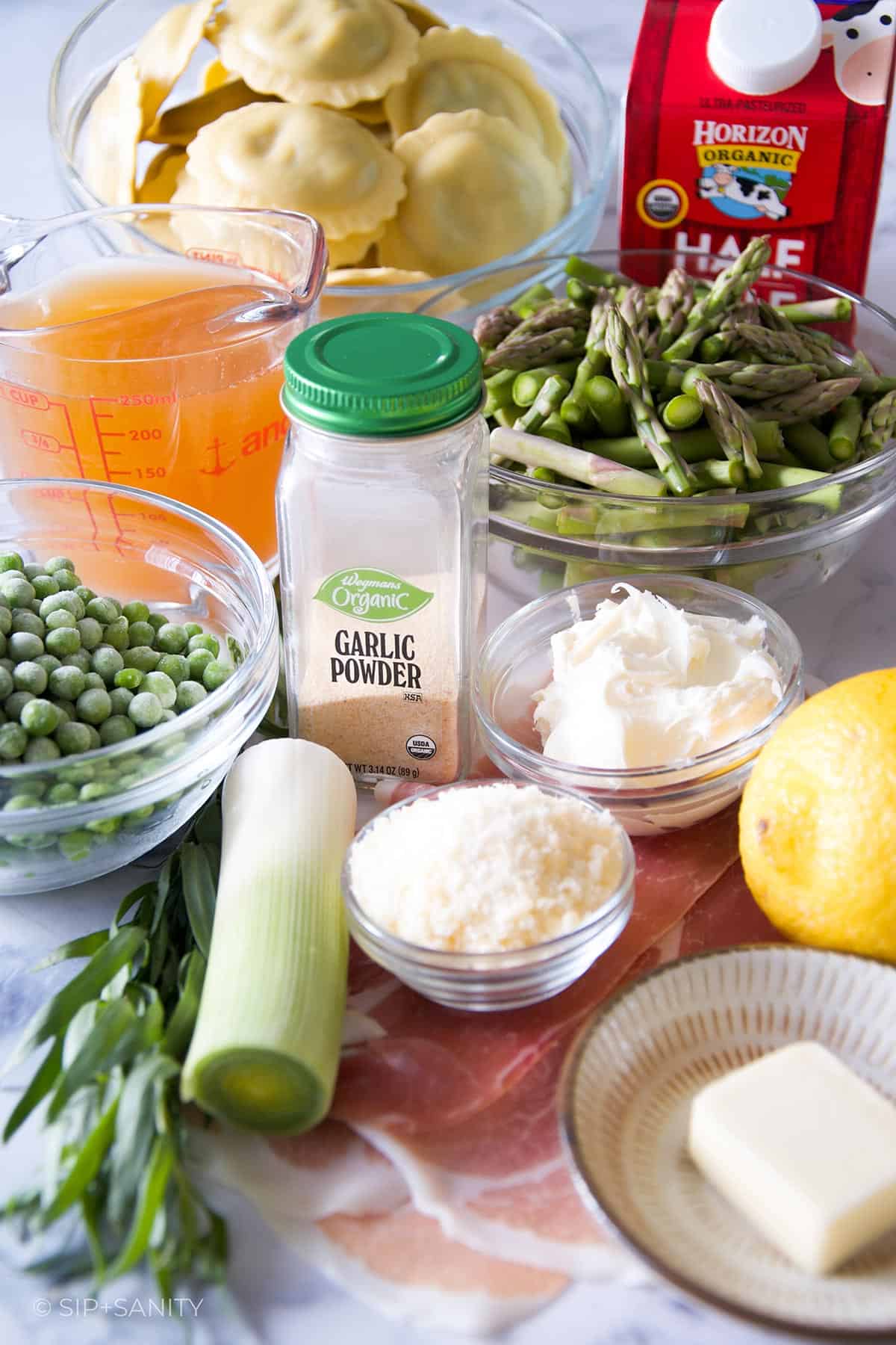 Ingredients for creamy mushroom ravioli with spring vegetables.