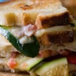 Closeup of vegetarian antipasto grilled cheese sandwiches.