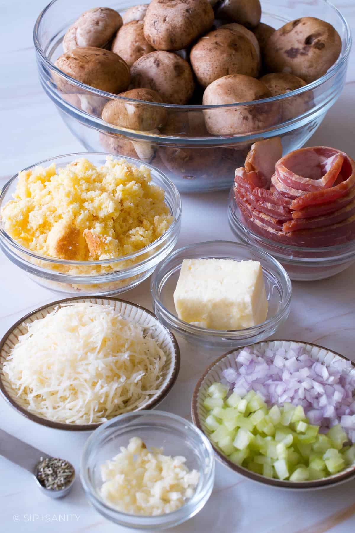 Raw ingredients for cornbread and bacon stuffing stuffed mushrooms.