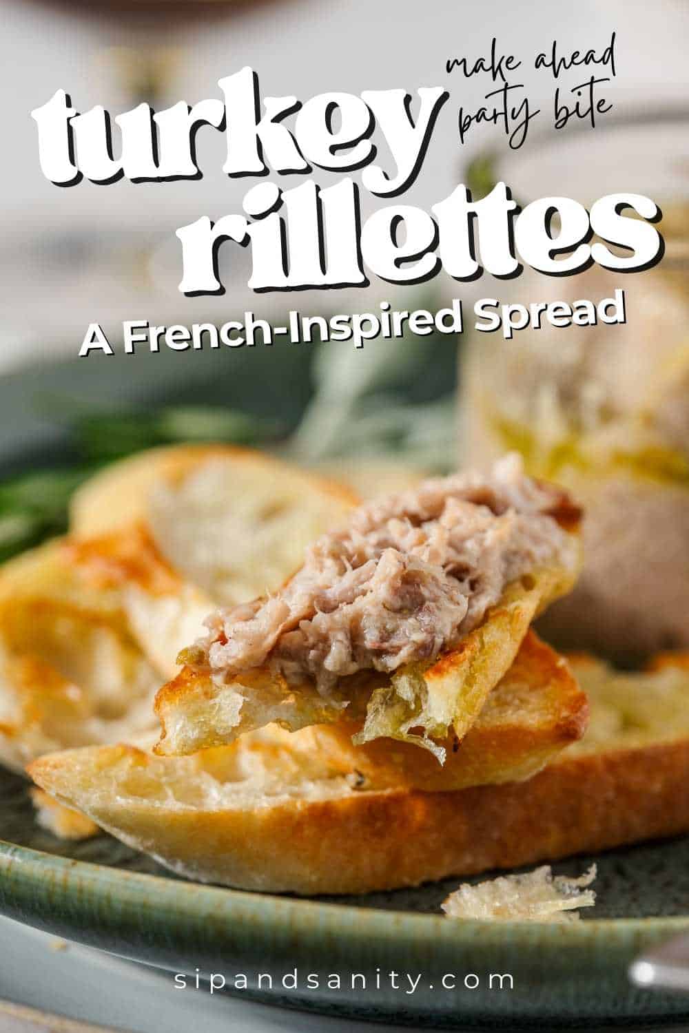 A close-up of toasted bread topped with turkey rillettes, with more bread and a jar of spread in the background.