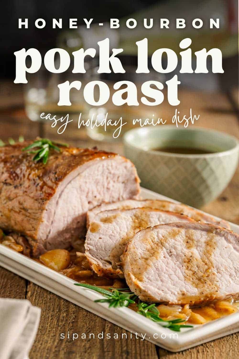 Sliced pork loin roast with herbs on a platter and sauce, next to a bowl of sauce. Text: Honey-Bourbon pork loin roast.