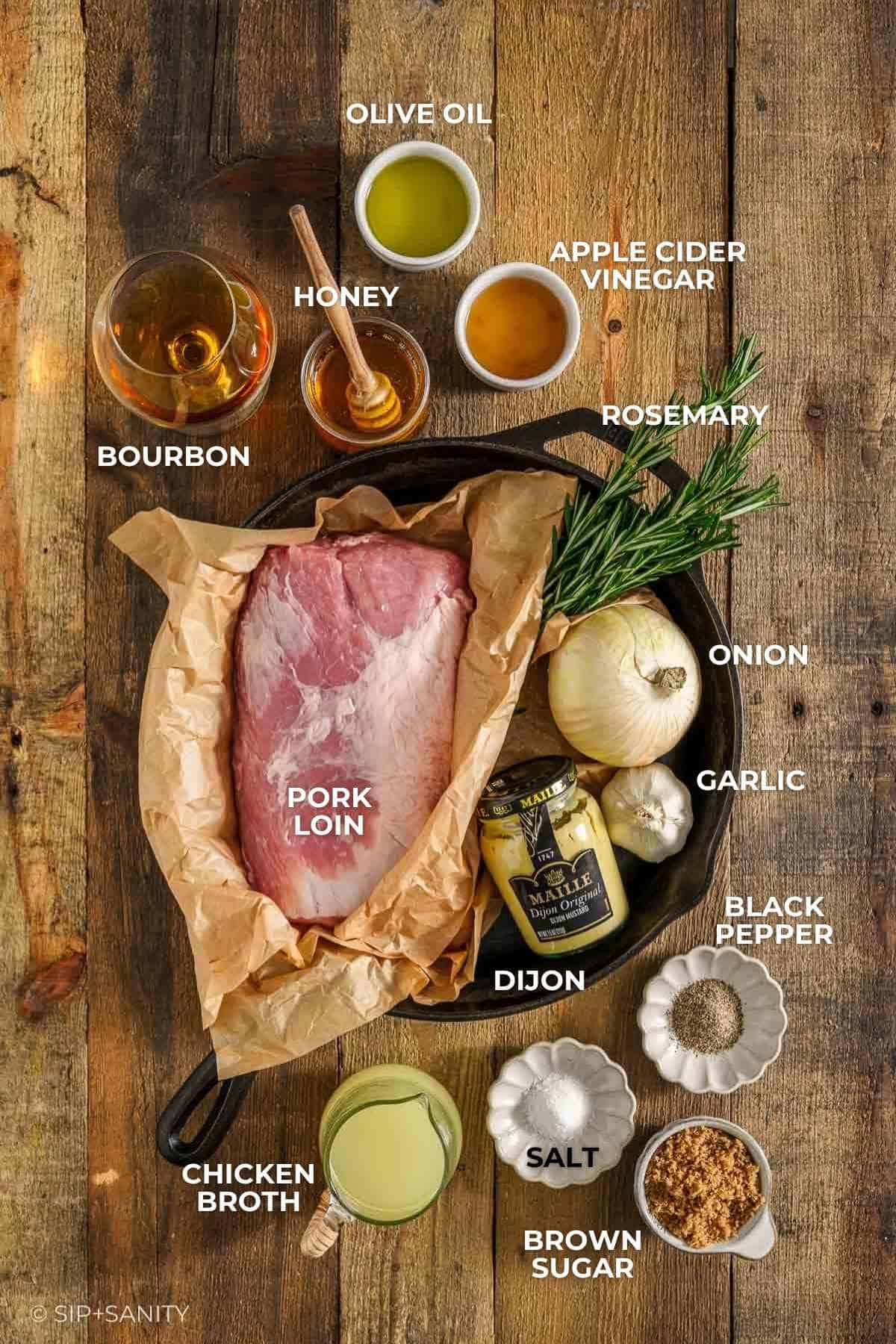 A flat lay of labeled ingredients for a pork loin dish.