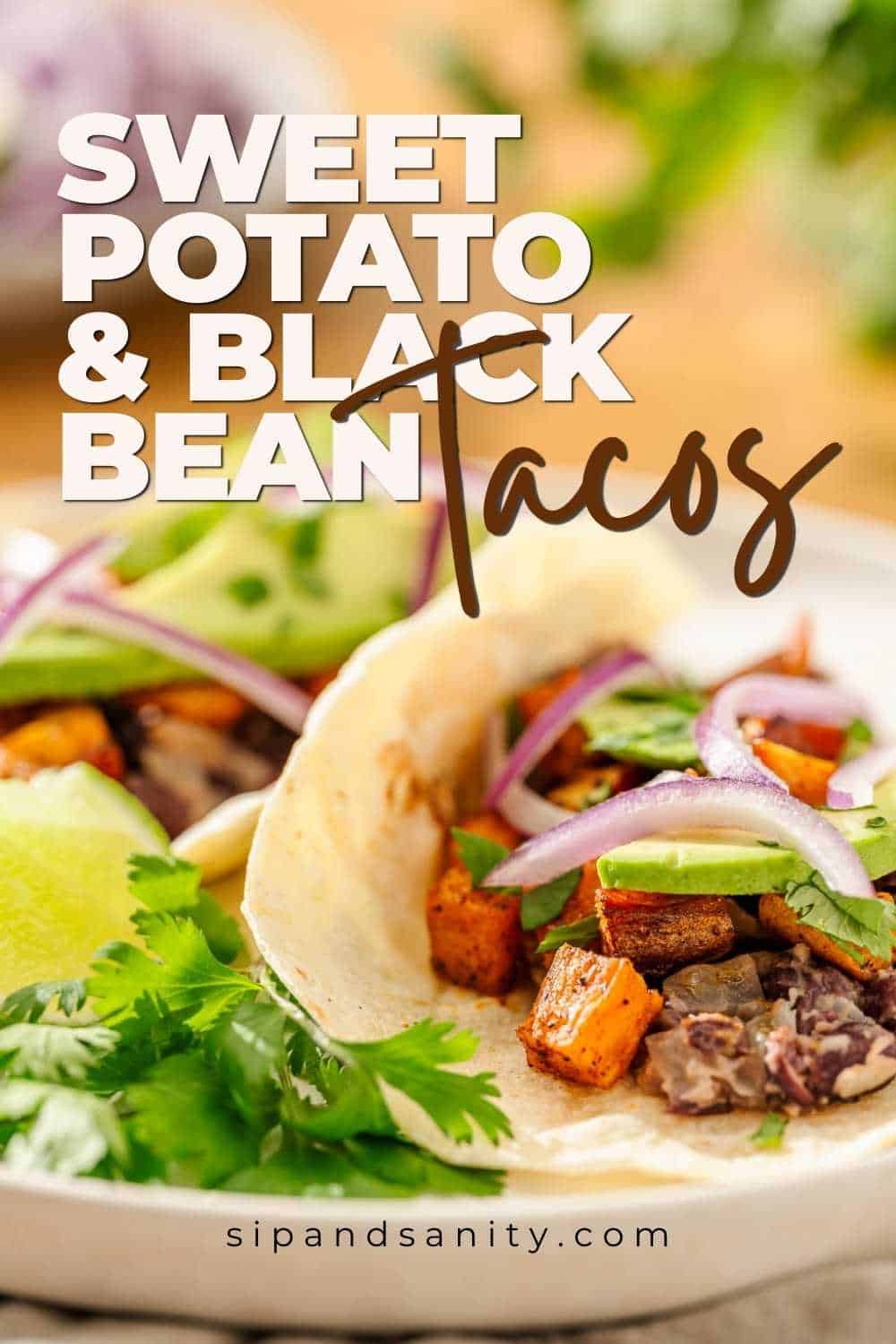 Close-up of sweet potato and black bean tacos with avocado, red onion, cilantro. Text: Sweet Potato & Black Bean Tacos.