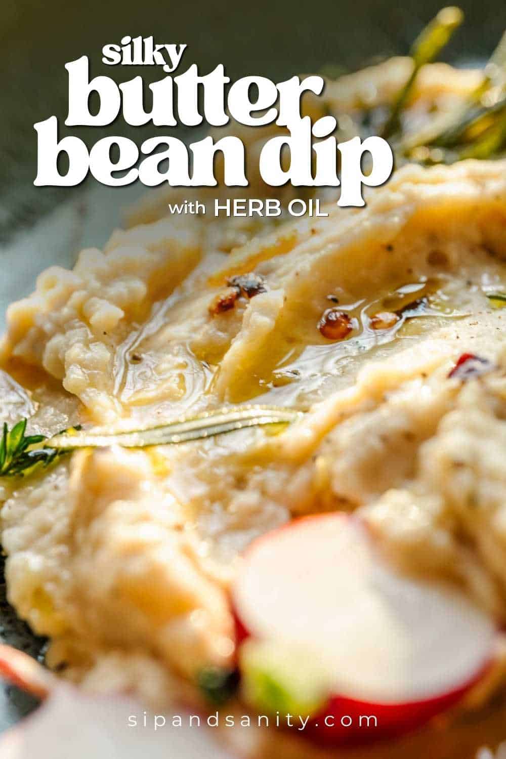 Creamy butter bean dip topped with herb oil, herbs, and radish slice. Text: silky butter bean dip with herb oil.