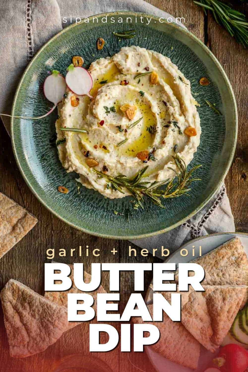 Creamy butter bean dip with garlic, herbs, oil, and radish slices on green plate with pita. Text: “Garlic + Herb Oil Butter Bean Dip.”.
