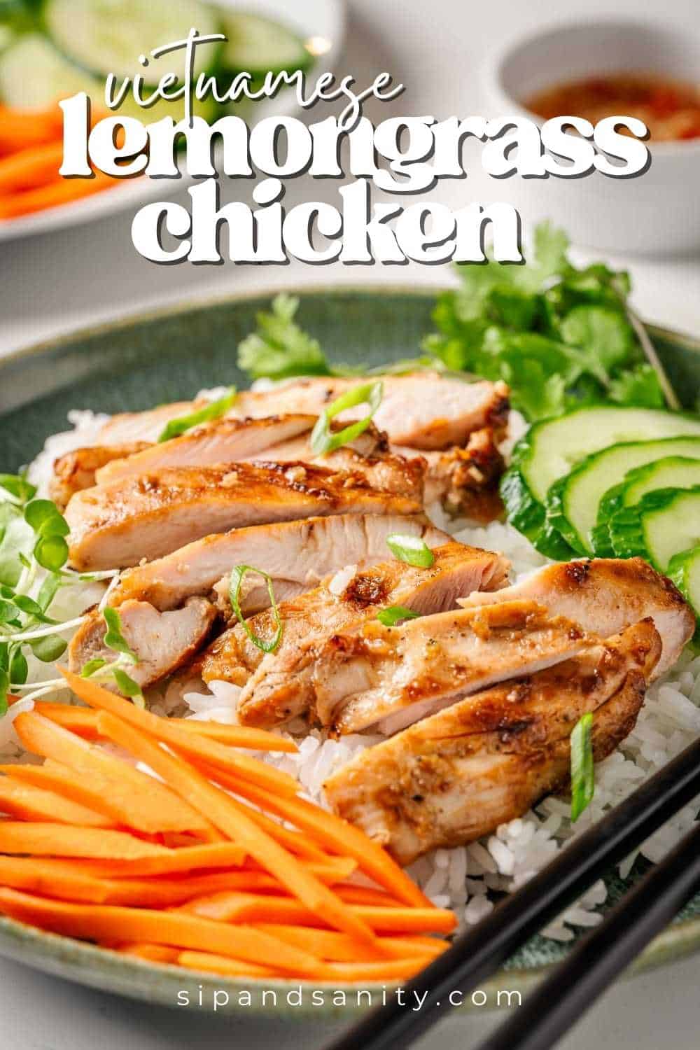 Vietnamese lemongrass chicken over rice with cucumbers, carrots, green onions, cilantro, and sauce. Text overlay present.