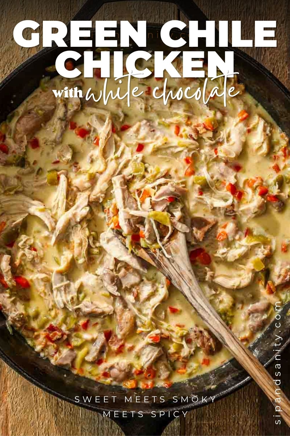 Shredded chicken, green chiles, red peppers, and white chocolate in a skillet with creamy sauce. Text: Green Chile Chicken.